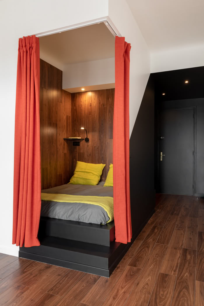 Création d'un espace nuit en alcôve avec menuiserie personnalisée, projet de rénovation Moselle.