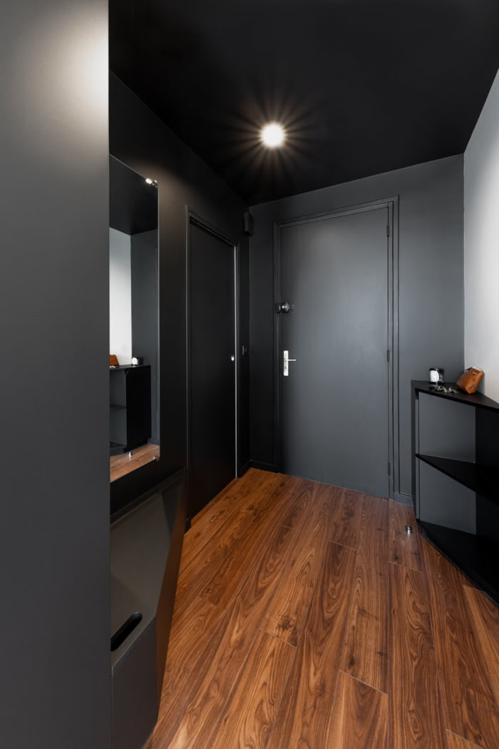 Rangement et dressing sur mesure avec portes coulissantes intégrées pour petit espace, réalisé par votre architecte à Metz.